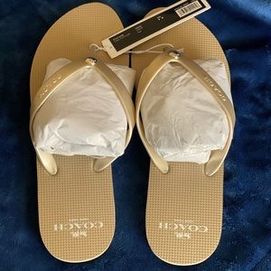 COACH GOLD FLIPFLOPS, NWT, NEVER WORN, AS SHOWN. PERFECT FOR SUMMER OR INDOOR